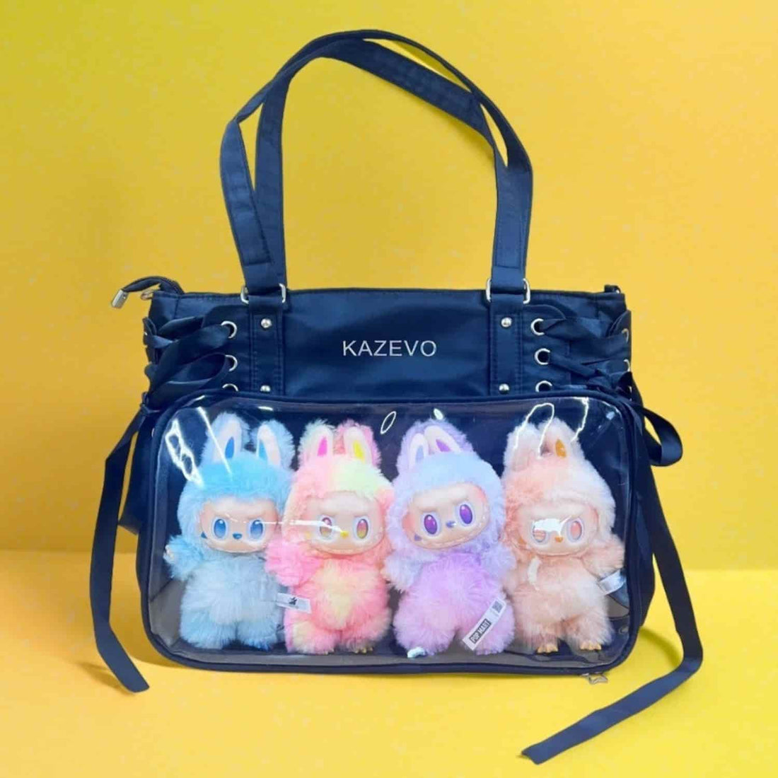 large lace black ita bag with clear window holding Labubu plushies displayed in front pocket