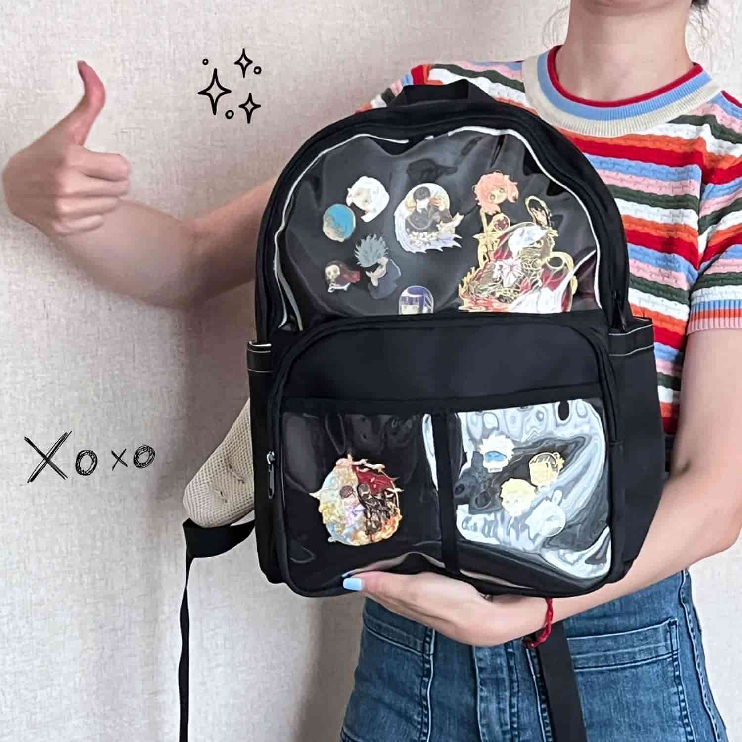 model carrying black ita backpack showing size and fit