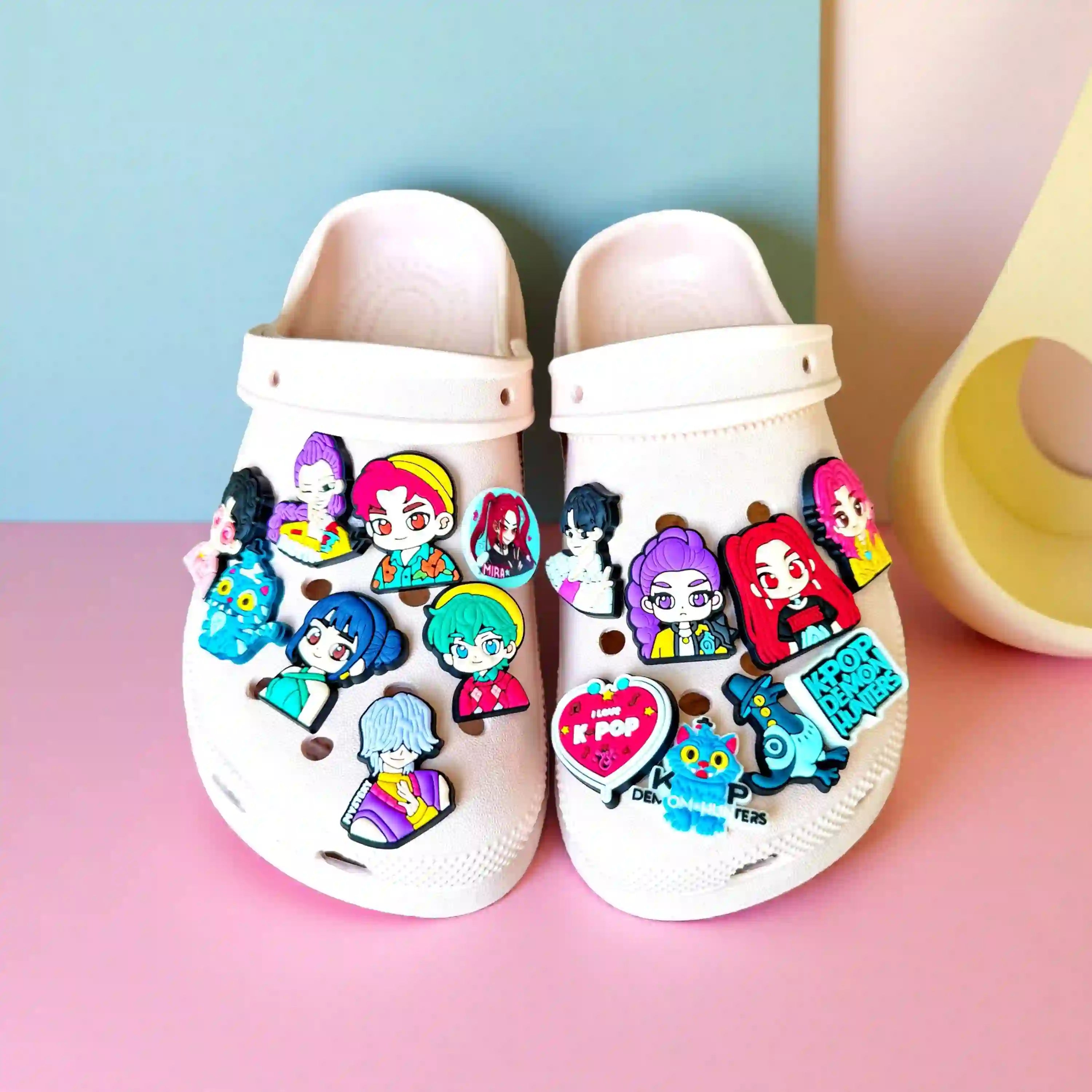 photo of crocs shoes decorated with  kpop demon hunters crocs charm