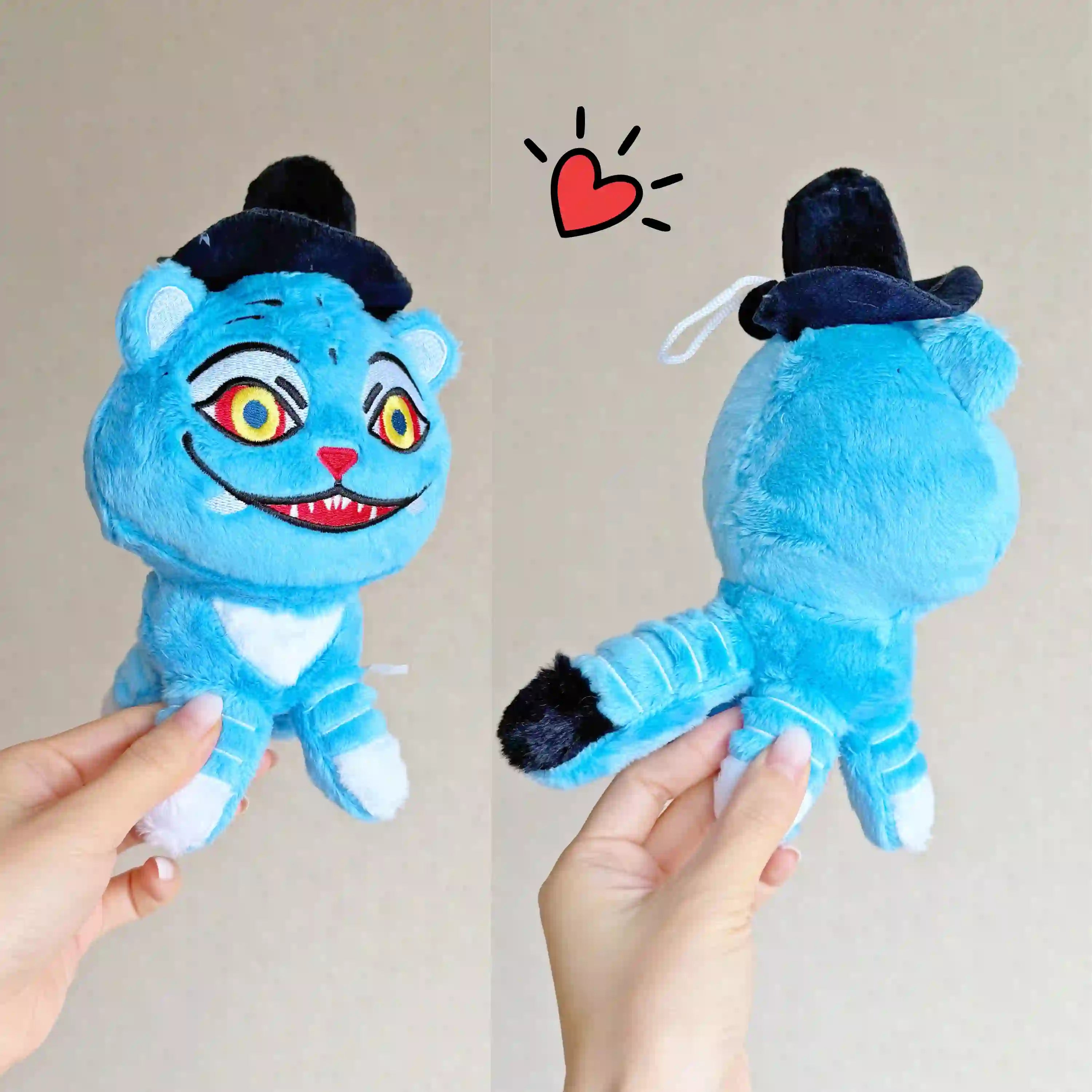 photo showing front and back view of kpop demon hunters derpy the tiger plush doll