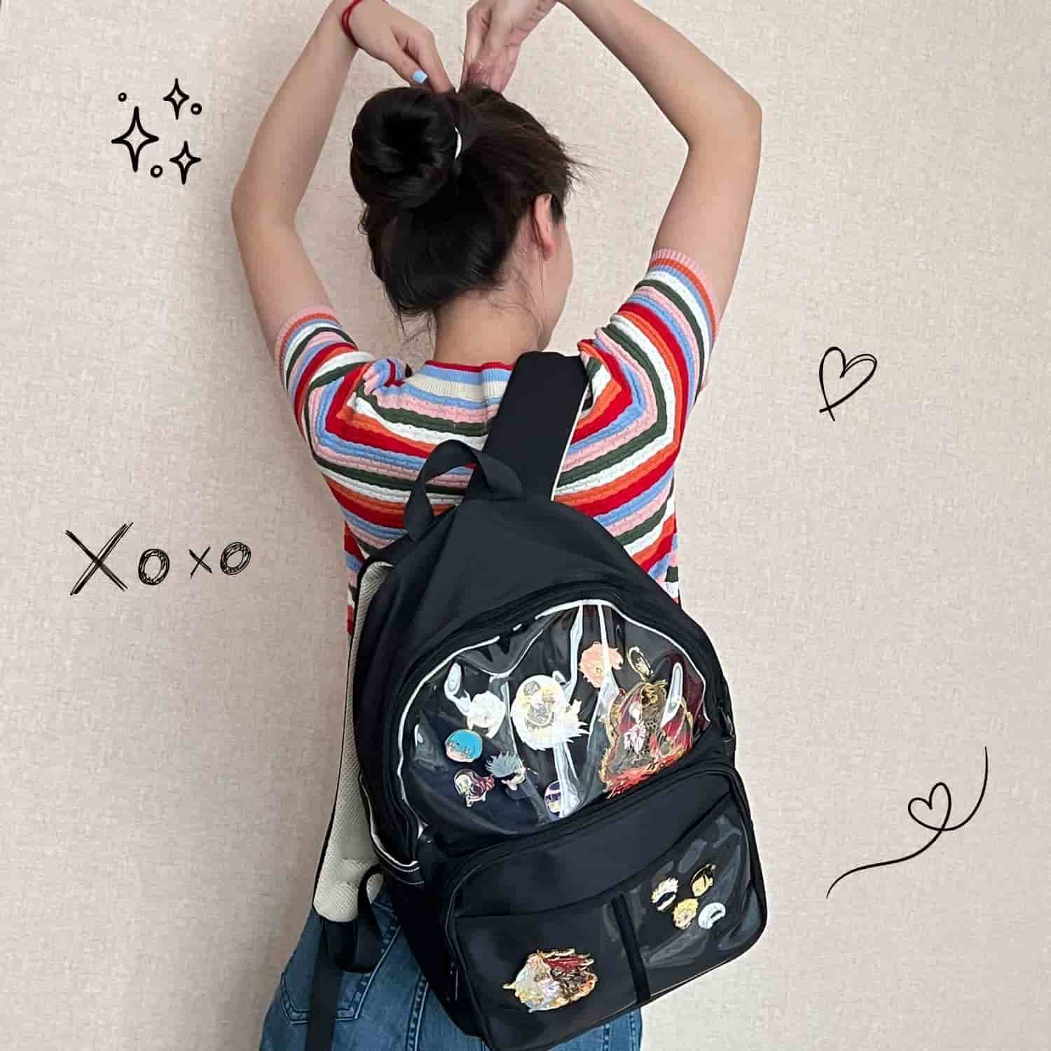 model wearing large black ita backpack styled for everyday use